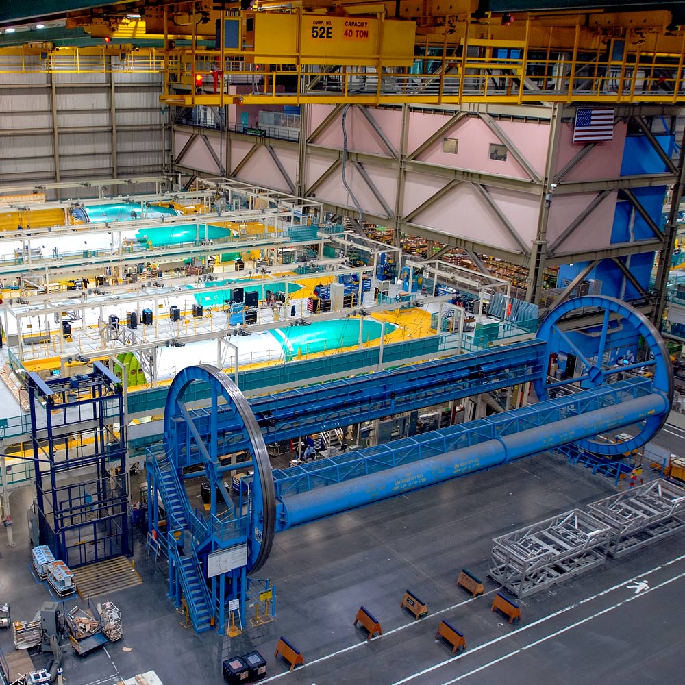 Early in production, Boeing assembled 777 fuselage sections using, fixed, floor-mounted jigs.