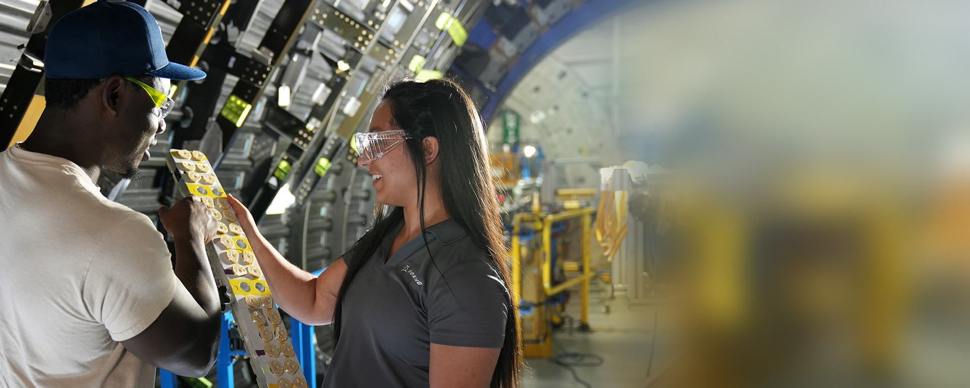 Boeing employee working in plane interior